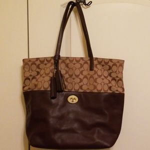 Plum colored large coach purse